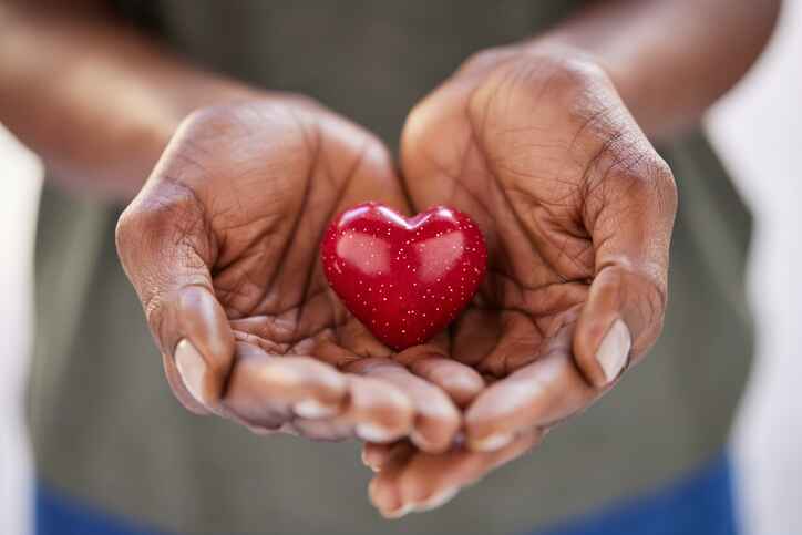 Hands holding a heart symbolizing charitable donation support for Gilead Healing Center